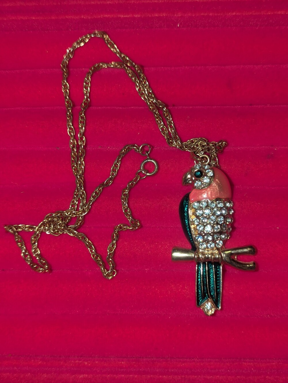 Gold-Tone Pink Parrot Pendant Necklace with Crystal Accents